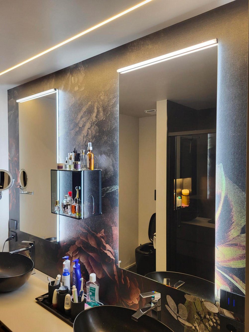 Modern bathroom by Casa Evolution with bold design and curated details